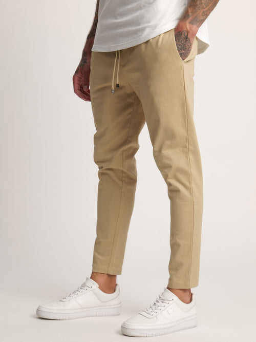 WOVEN PANTS Beige / 46