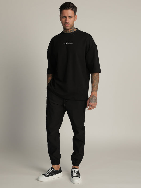 WOVEN PANTS Black / 48